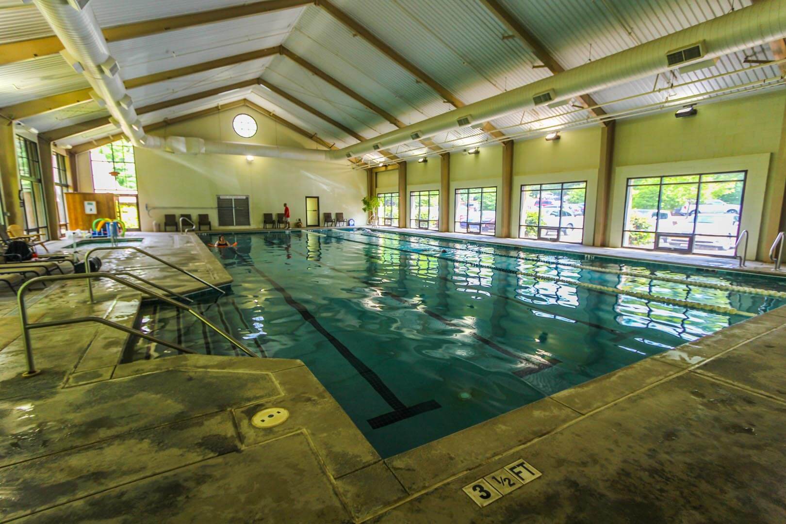 An expansive indoor swimming pool at VRI's Golf Club Villas in Marble Hill, Georgia.